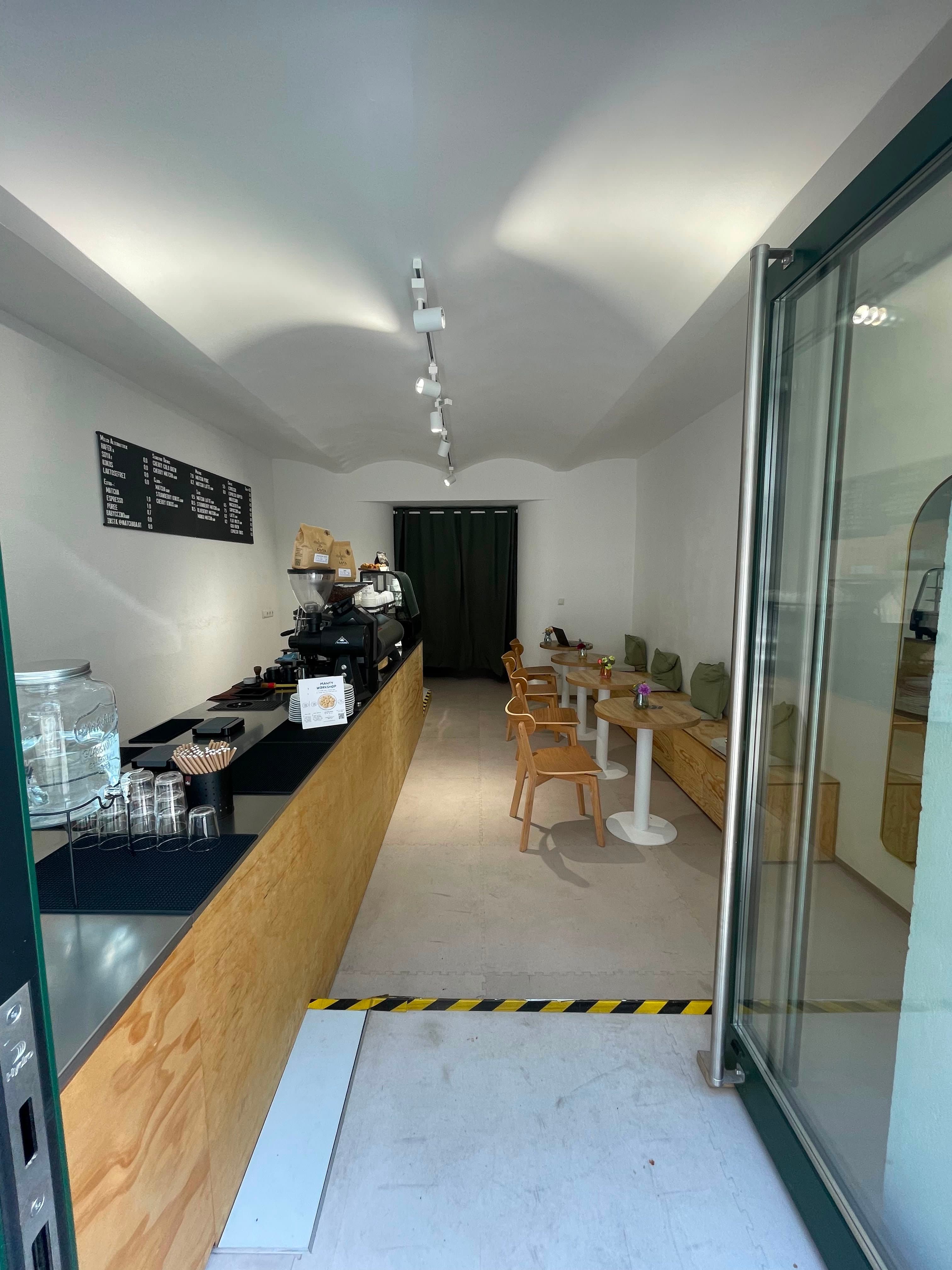 MatchaBa Cafe interior with counter and seating in Vienna