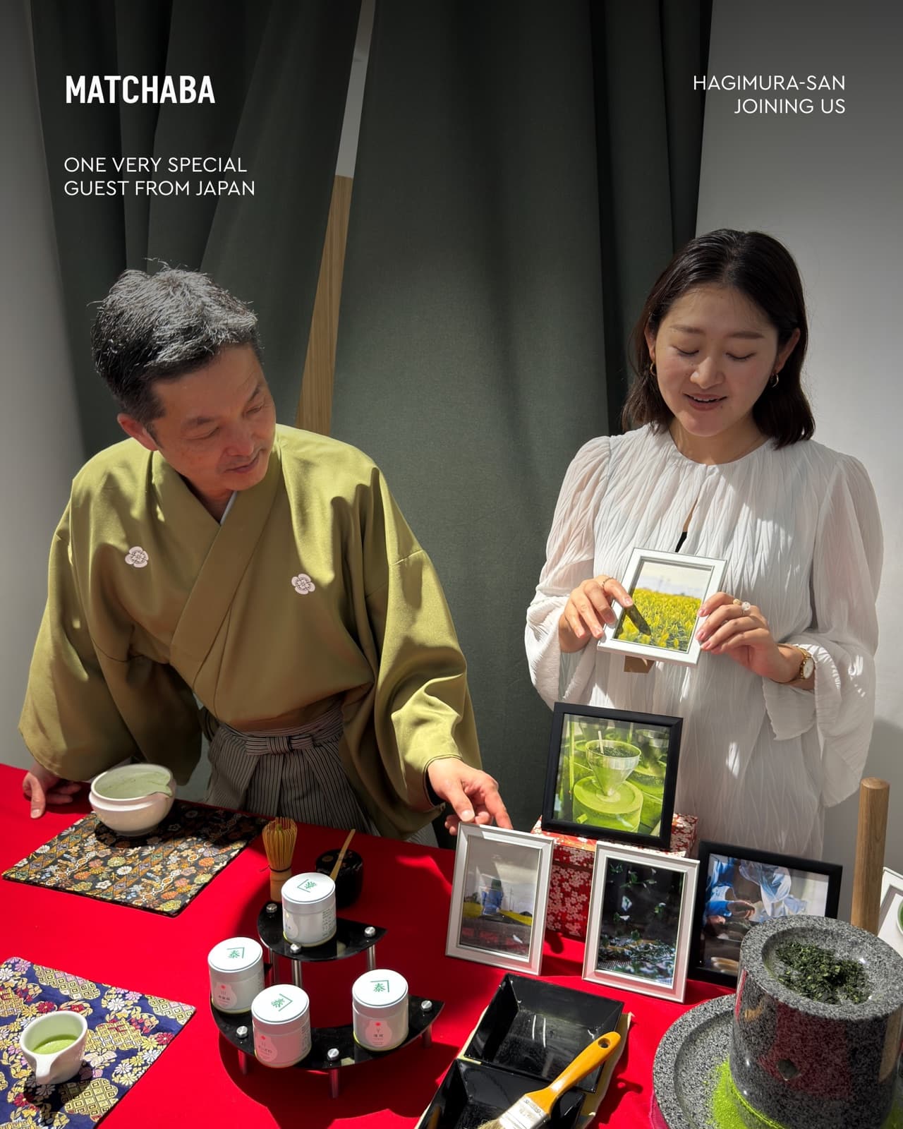 Hagimura-san in a kimono at a table of tea tins and bowls, beside him a woman holding pictures of the tea field
