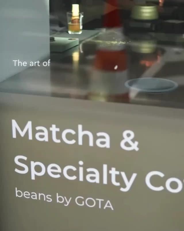 MatchaBa's shop window, then matcha being sifted, whisked and poured over milk and fruit purée, and an espresso running into a GOTA cup